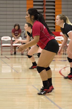 Mia Due, Everett’s defensive specialist, awaits an oncoming offensive attack from shoreline. 