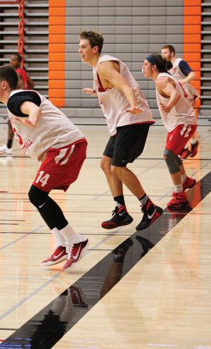 Members of the EvCC Men’s basketball team during drills at practice in the Walt Price Student Fitness Center on Oct. 27, 2016. Conner Moffatt is pictured with toilet paper in his nose because of the physical activity exerted during practice, which led to a bloody nose.