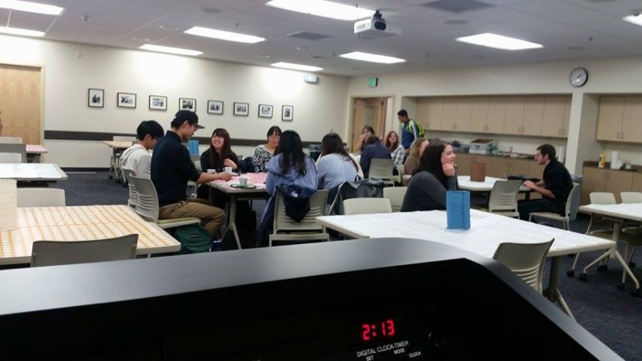 EvCC students enjoying a warm cup of tea, while chatting it up during the Japanese Fall Tea House. 