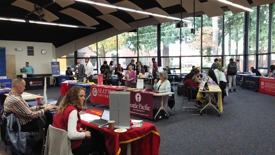 University booths in Jackson Center await students. 