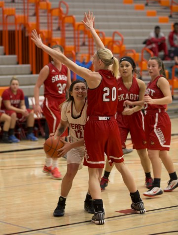 With her team down Breezy Shore is going up strong for a big bucket to try and get EvCC back in the game against Skagit Valley on Wednesday night. // Michael Rhodes