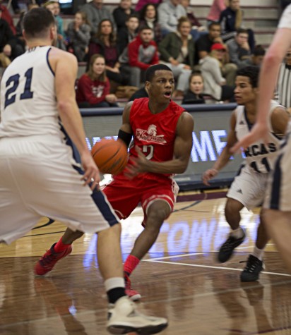 Trojans Catch Fire; Take First League Win
