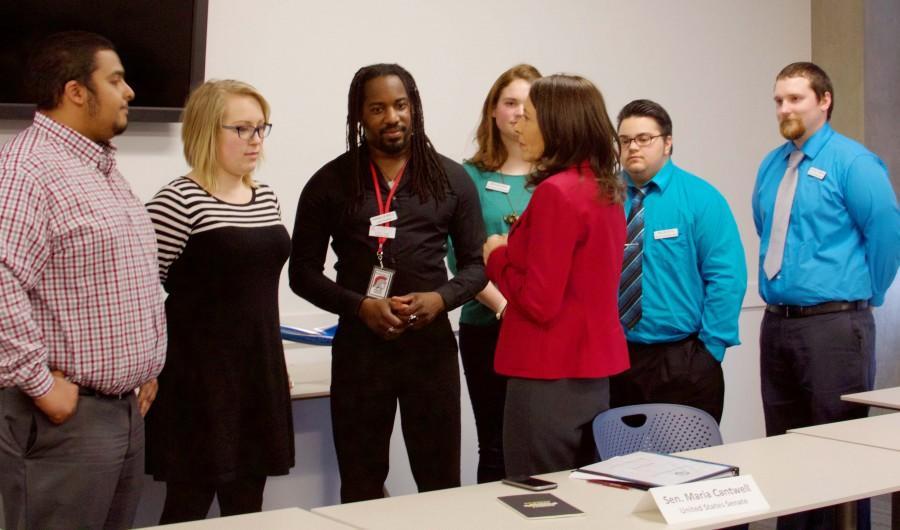 Sen. Maria Cantwell faces students to thank them for sharing their stories.