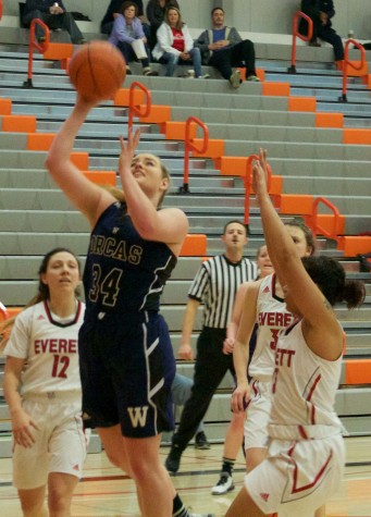 Lindsey Honeycutt going up strong to the basket for another two point bucket. Honeycutt finished the game with 28 Points and 13 Rebounds against the Trojans in the Walt Price Fitness Center on February 6, 2016.