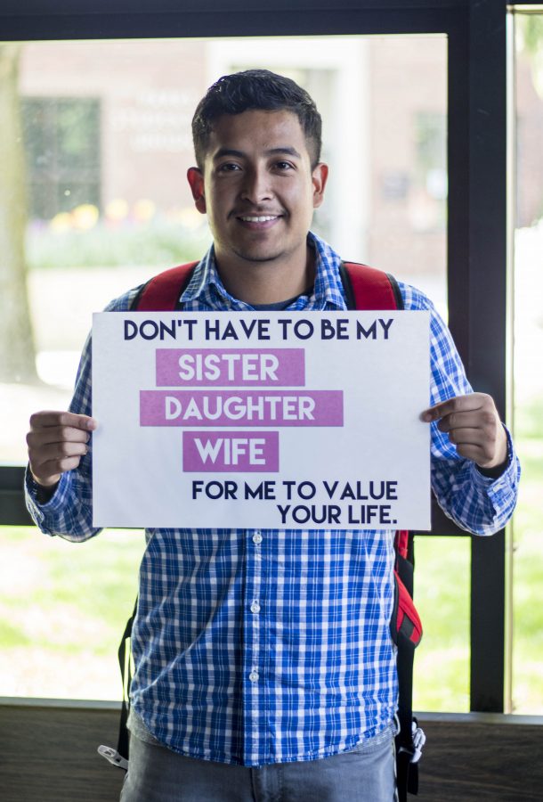 Student Jose Sierra showing his support to the feminist cause and his friends.