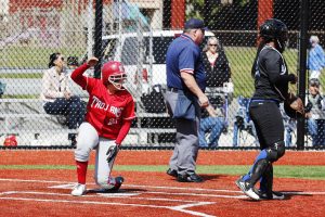 Anya Predojevic safely sliding into home base against Edmonds Community College on April 26th 2016.