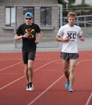 Stephen Dietz and Kyler Sager, sophomores on the EvCC track and field team, warming up for their early morning practice. The sophomores on the team are dedicated, they spend time working out when not at practice as much as possible. 