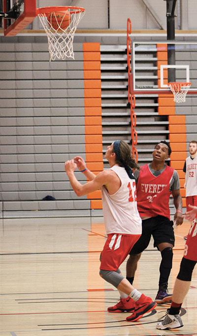 Conner Moffatt looks to grab a rebound during a five on five drill at practice on Oct. 27, 2016. Moffatt is a 6’3 freshman from Spokane who looks to help the Trojans this season. 