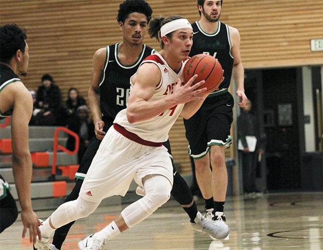 Conner Moffatt slices through the defense in transition. 