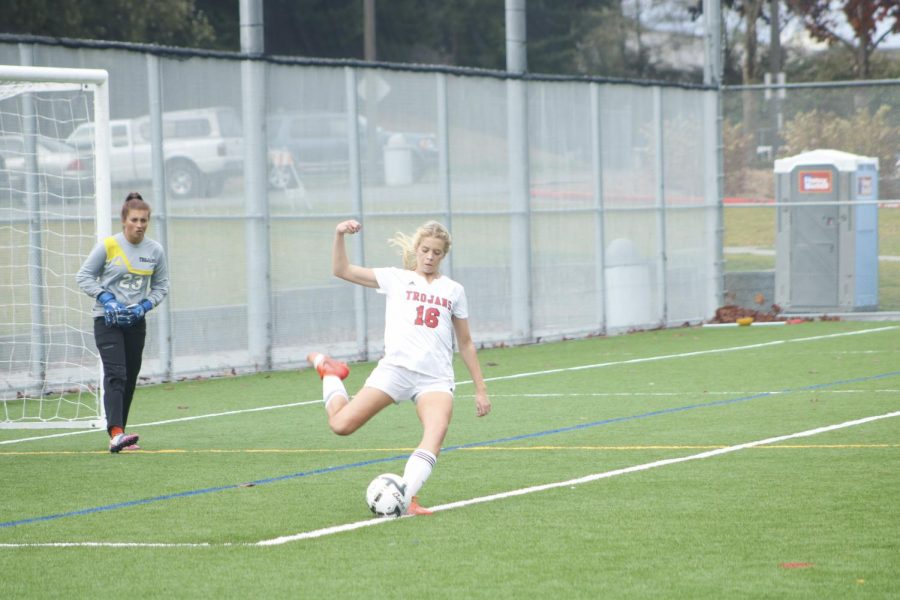 Lindsey Weikel boots the ball down field during Everetts game against Peninsula.