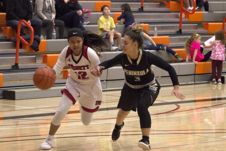 Aloha Salem drives to the rim during Everetts win over Peninsula. The Trojans took sole possession of NWAC North with their win on Saturday. 