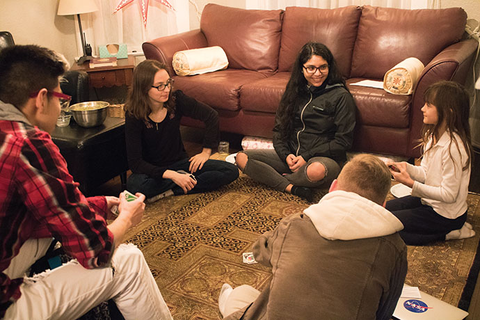 EvCC students and SWE Club members, Hanna Wells and Hilda Pacheco, with the club advisors’ daughter, Zandrea Washburn. The club members gather at the Washburn home to play games and socialize.