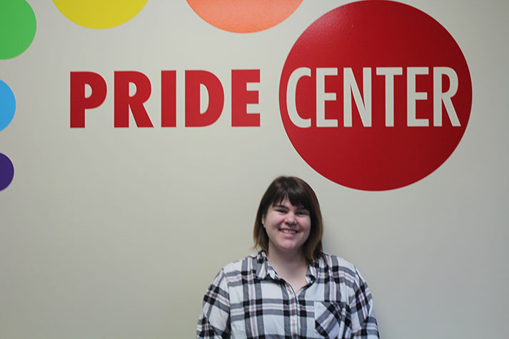 Ruth Barnes, an EvCC student and CHC patient, is shown in the Pride Center. She likes that the clinic takes her insurance. She said, “The only thing I care about is that I don’t have to pay for it.” 