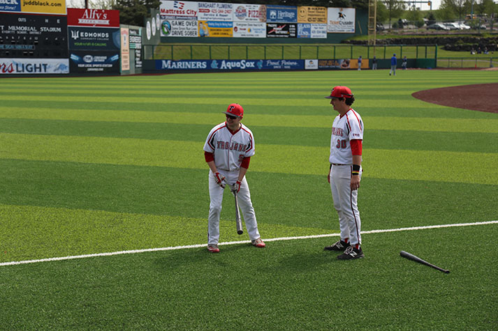 Cameron McGrath warms up alongside teammate Marcus McCannel. McGrath is committed to play baseball for Central Washington University.