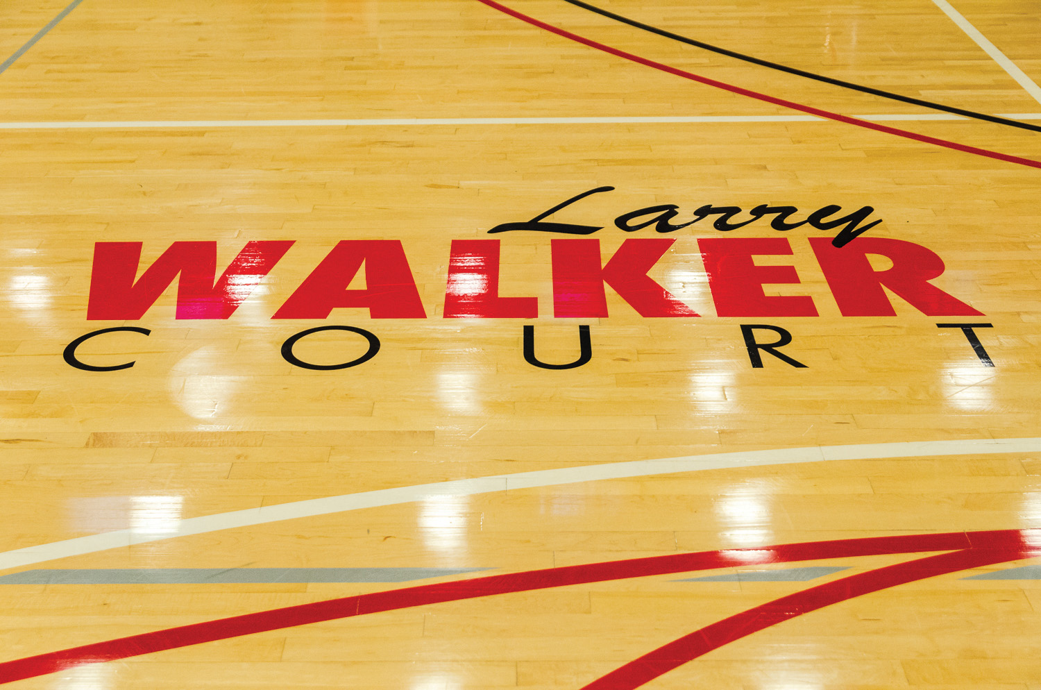 EvCC names basketball court in honor of retired athletic director Larry  Walker