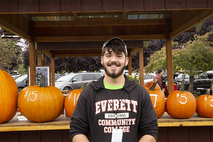 Evan Wilcox, 18, a current EvCC student has been working at Swans Trail Farm for four years. 