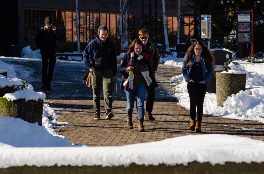 Students return to re-opened campus after record snowfall in the Pacific Northwest caused several days of campus closures and late starts. 