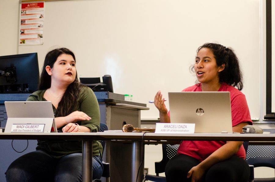 ASB VP of Budget Madison Gilbert and Vice President of Administration Araceli Daza in discussion at the ASB Senate meeting. The Senate voted unanimously to approve the budget increase, which would largely go toward raising minimum wage of student workers. 