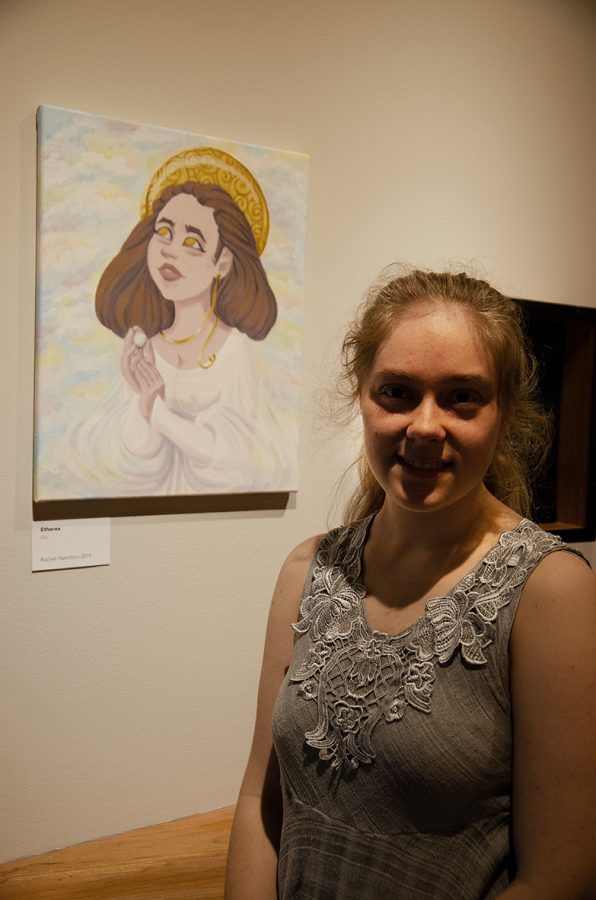 Art student Rachel Hamilton pictured with her oil painting titled, Etherea.