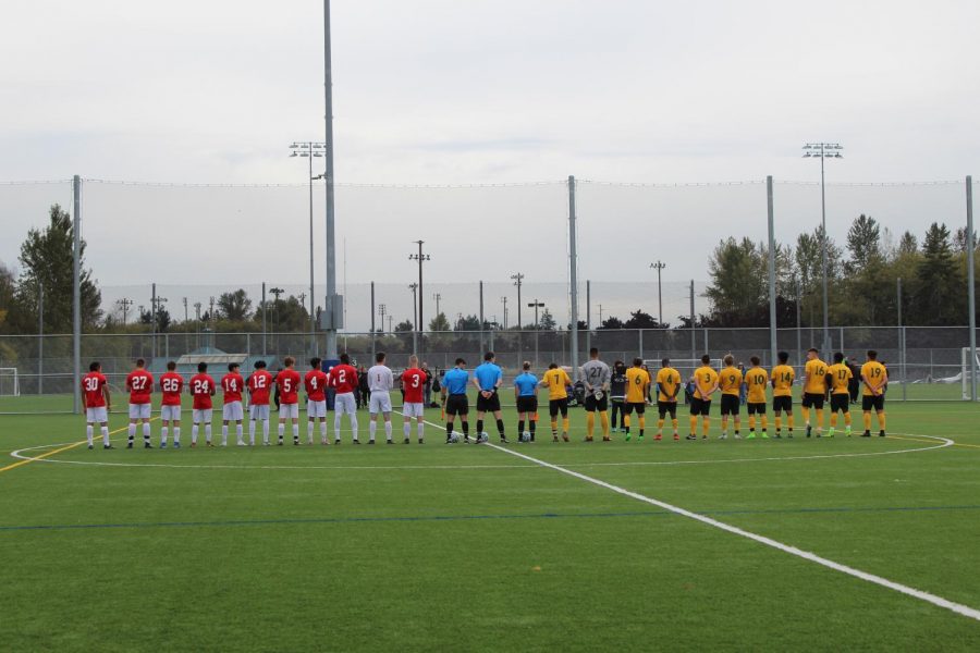 EvCC mens soccer team 
 line up to begin a match against Shoreline.