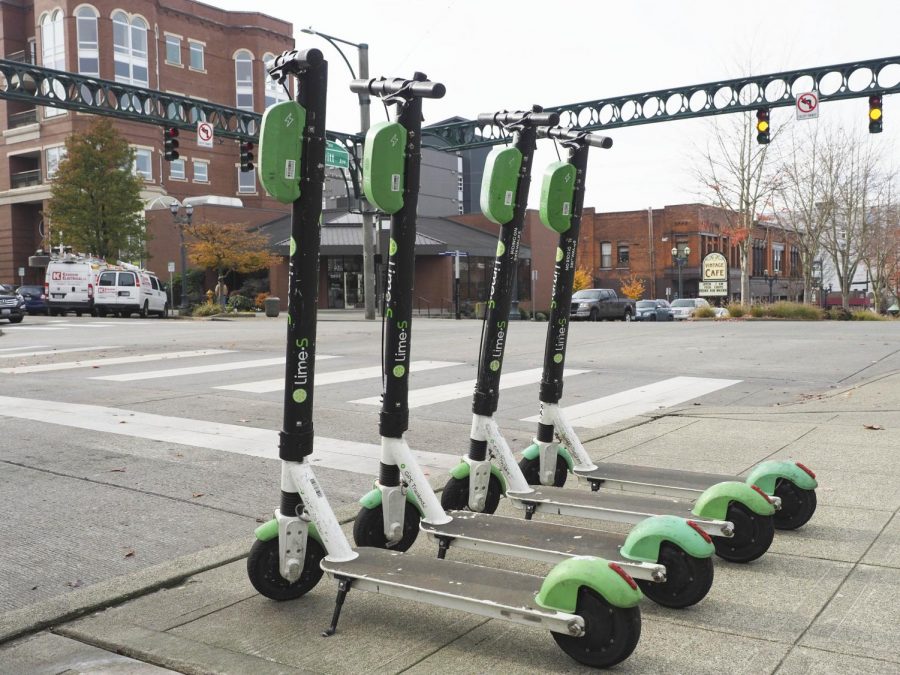 Lime scooters parked on the corner of Colby and Hewitt in Everett. “They are heavier than I expected and a little wobbly at first but I really like Lime scooters,” said Madison Efaw, an EvCC nursing student.