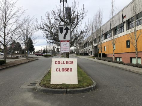 A sign reads, College Closed outside of White Horse Hall on Thursday Mar. 5 after the school closes early to clean because of  COVID-19.  