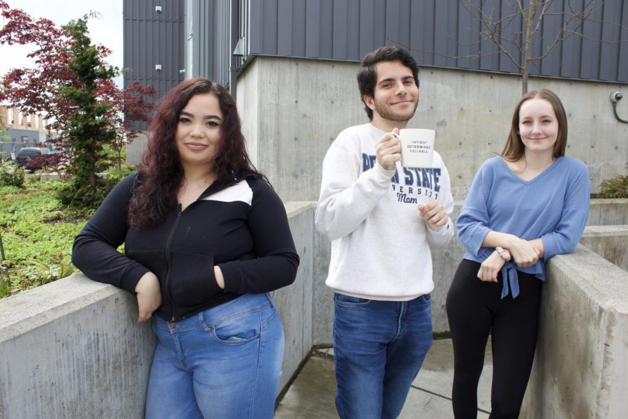Some residents of EvCC student housing have stayed put during the COVID-19 pandemic. From left to right, Shawntel Martinez, Anselmo De Sousa, and Madison Lambert outside of Mountain View Hall on April 23, 2020.