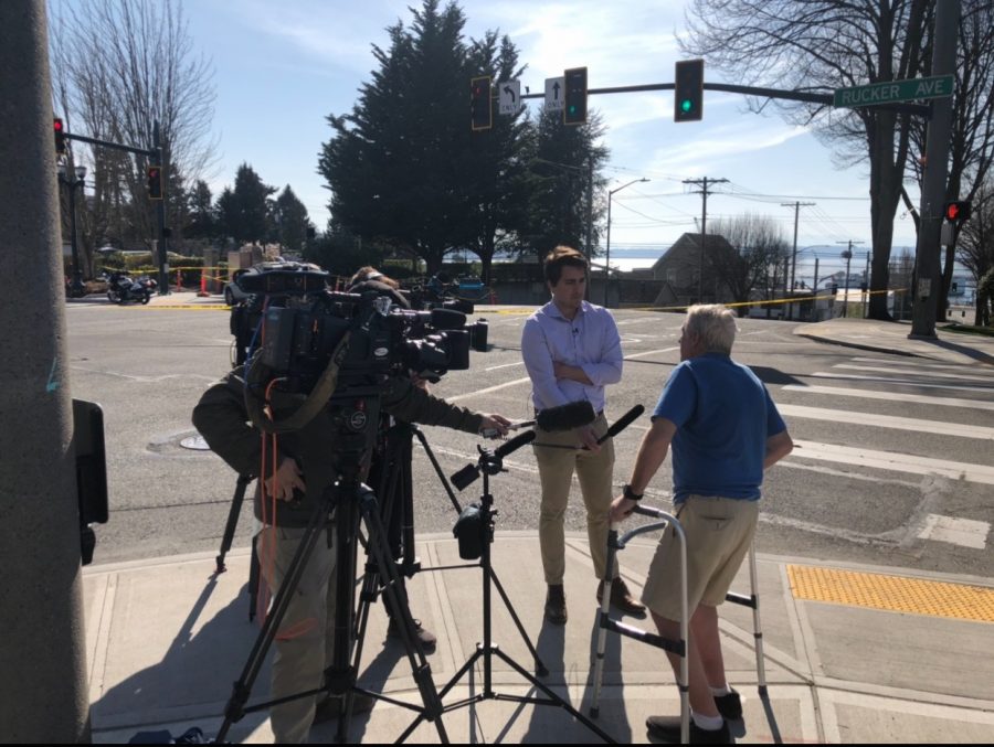 John clutches his walker while speaking with KCPQ-TV Q13 Fox reporter AJ Janavel about witnessing the shooting on the corner of Rucker and Everett Ave in Everett on Thursday April 9, 2020.