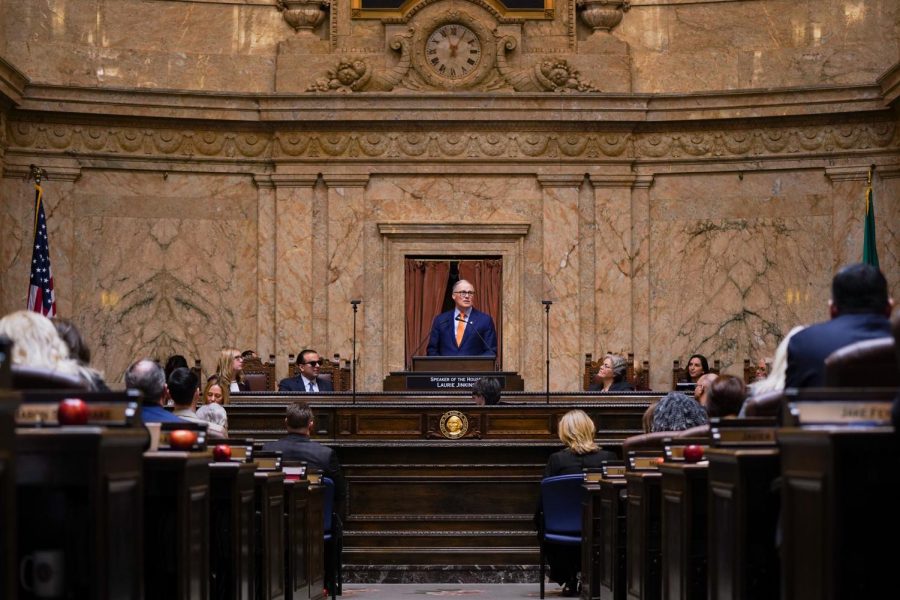 Washington State Gov. Jay Inslee signs new COVID-19 order to slowly reopen the states economy. This photo was taken at the 2020 State of the State Address on Tuesday, Jan. 14, 2020 at the Washington State Capital Building in Olympia. 