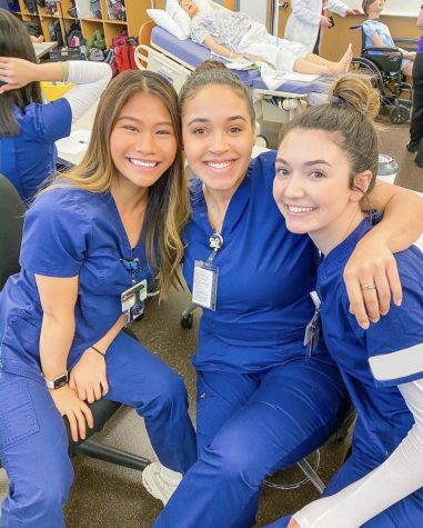 Nicole Nguyen (Left) smiles for a picture with her fellow cohorts during a lab day. 