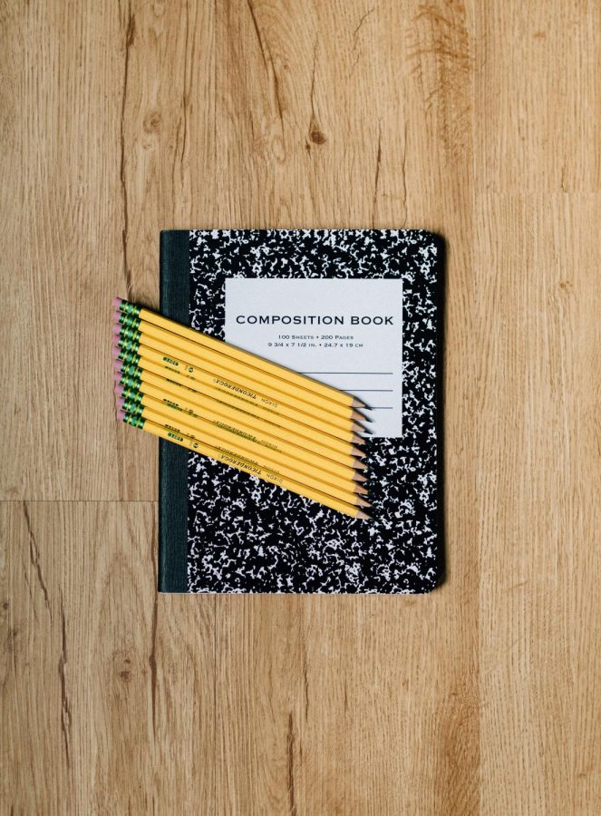 Composition notebook and pencils.