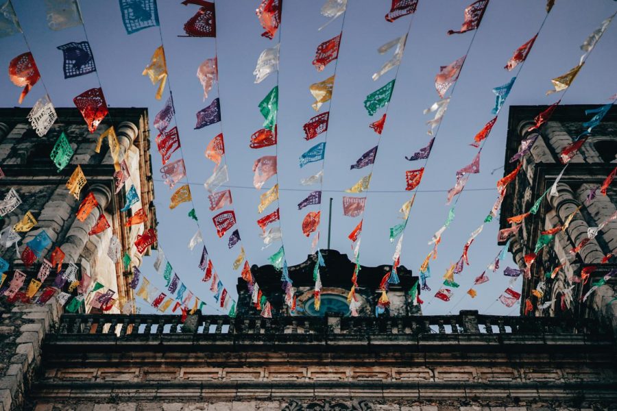 Papel picado: This type of folk art decoration is made out of tissue paper, the air will be moving the papel picado, making them feel like they’re there.