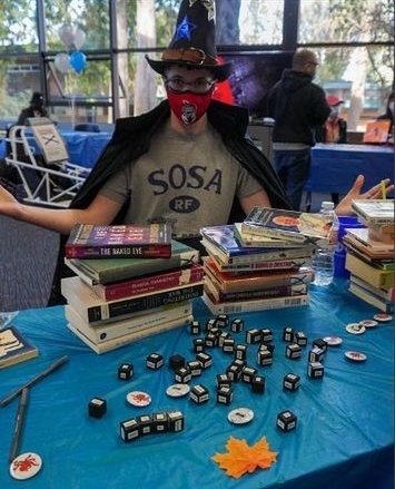 The table for the Writing Club at the farewell to Winter Quarter club fest. Photo Courtesy of Rachel Zook