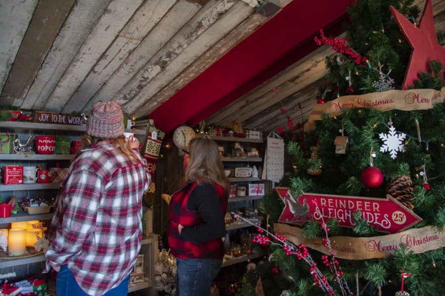 Customers view holiday gifts in the Wintergreen giftshop.