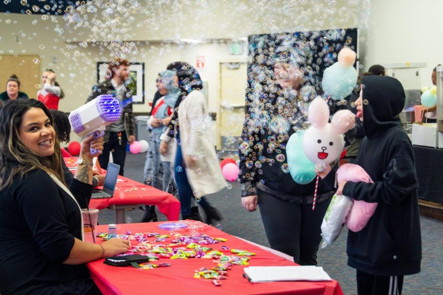 Students & Faculty like Alena Beloit, from EvCCs BRIDGES Center gathered in the Jackson Conference Center for this quarters Valentines themed club fest.