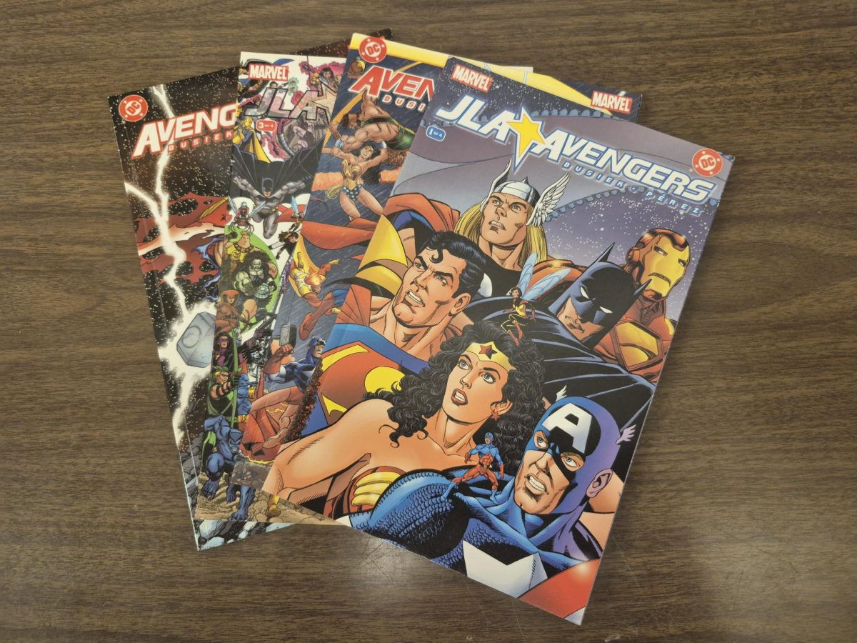 "JLA/Avengers" created by Kurt Busiek and George Perez released in 2003.