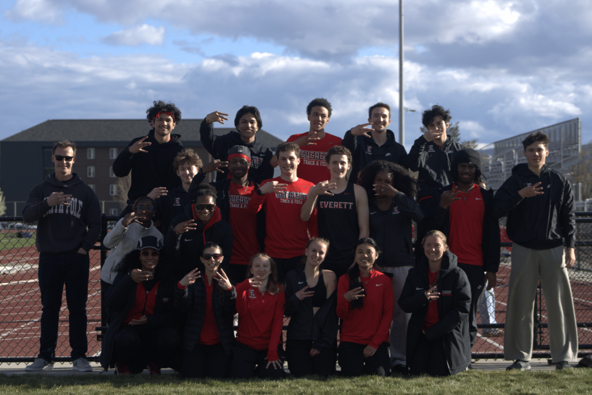 Athletes and coaches honor EvCC by throwing an "E" after a two-day meet at Central Washington University